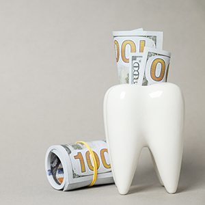 A tooth and some hundred-dollar bills