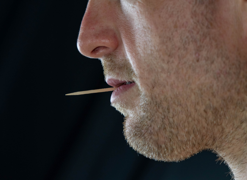Man with toothpick